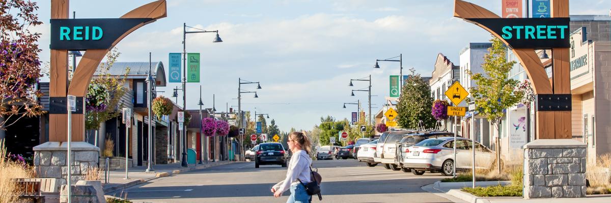 View of Reid Street gateway and people walking across the street